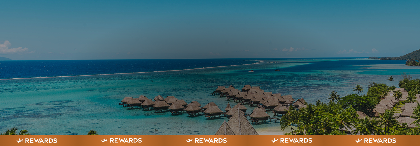 Overwater bungalows on a tropical lagoon