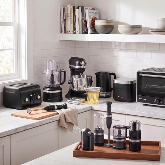 KitchenAid Black & Silver Collection lifestyle photo with Pasta Deluxe Set beside the stand mixer